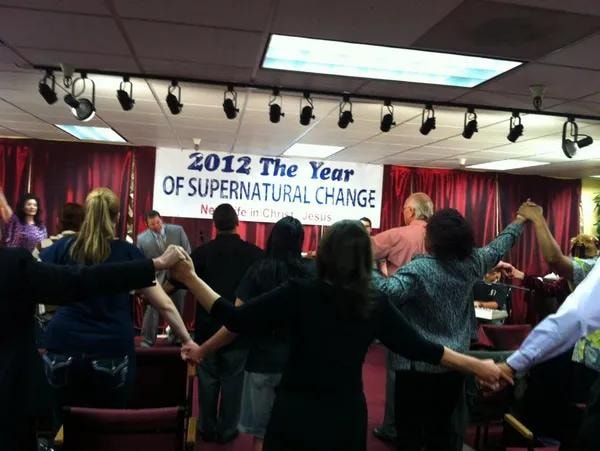 New Life In Christ Jesus Church congregation gathered in worship – 2012 The Year of Supernatural Change